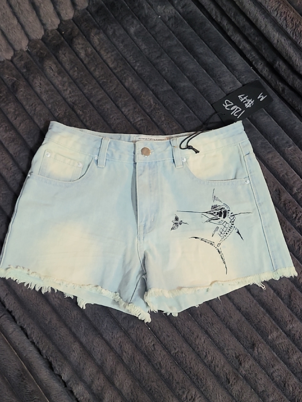 Light Blue Denim Women's Cutoff Shorts with Embroidered Fish Detail